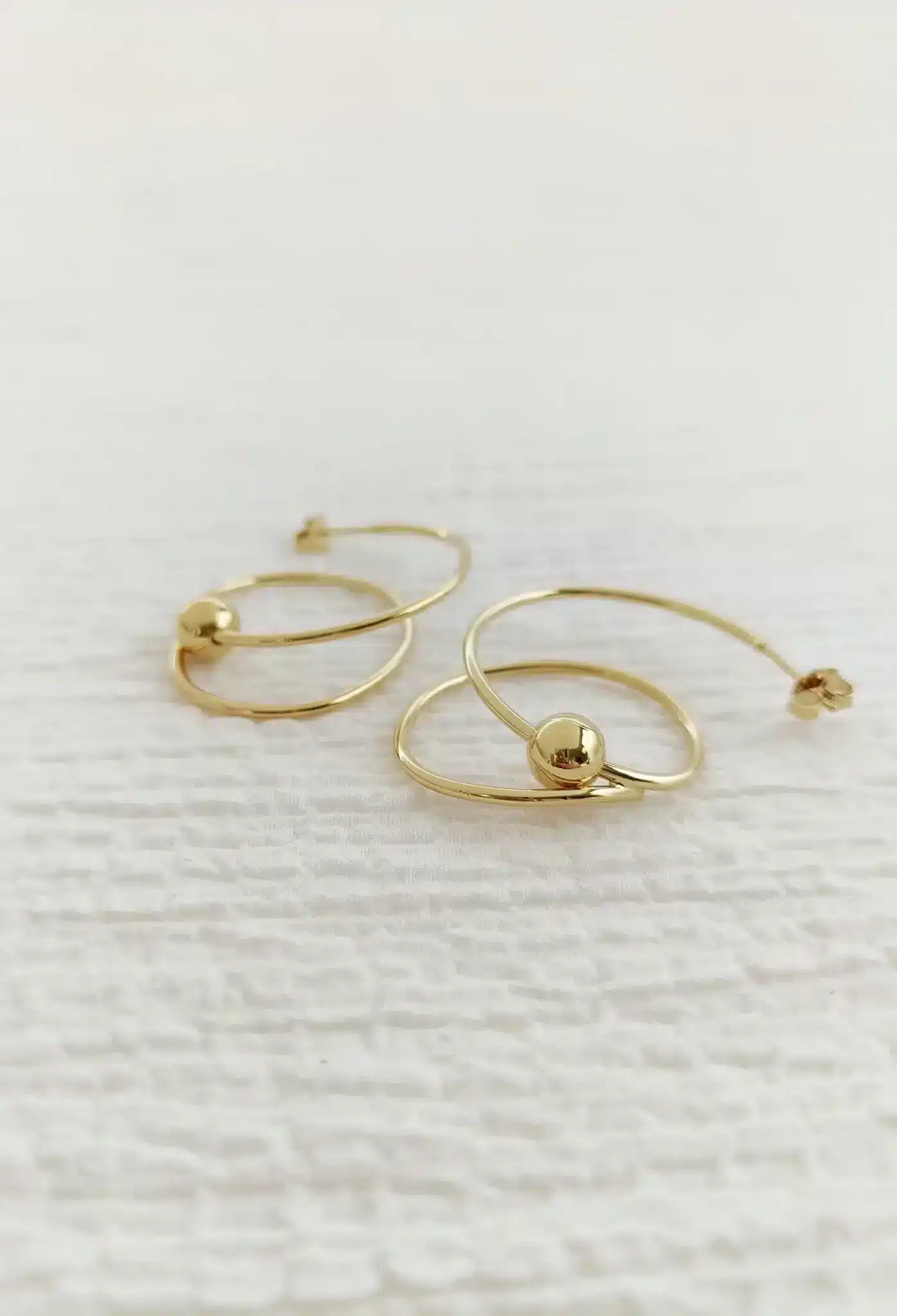 Boucles d'oreilles créoles dorées - Marie Duvert