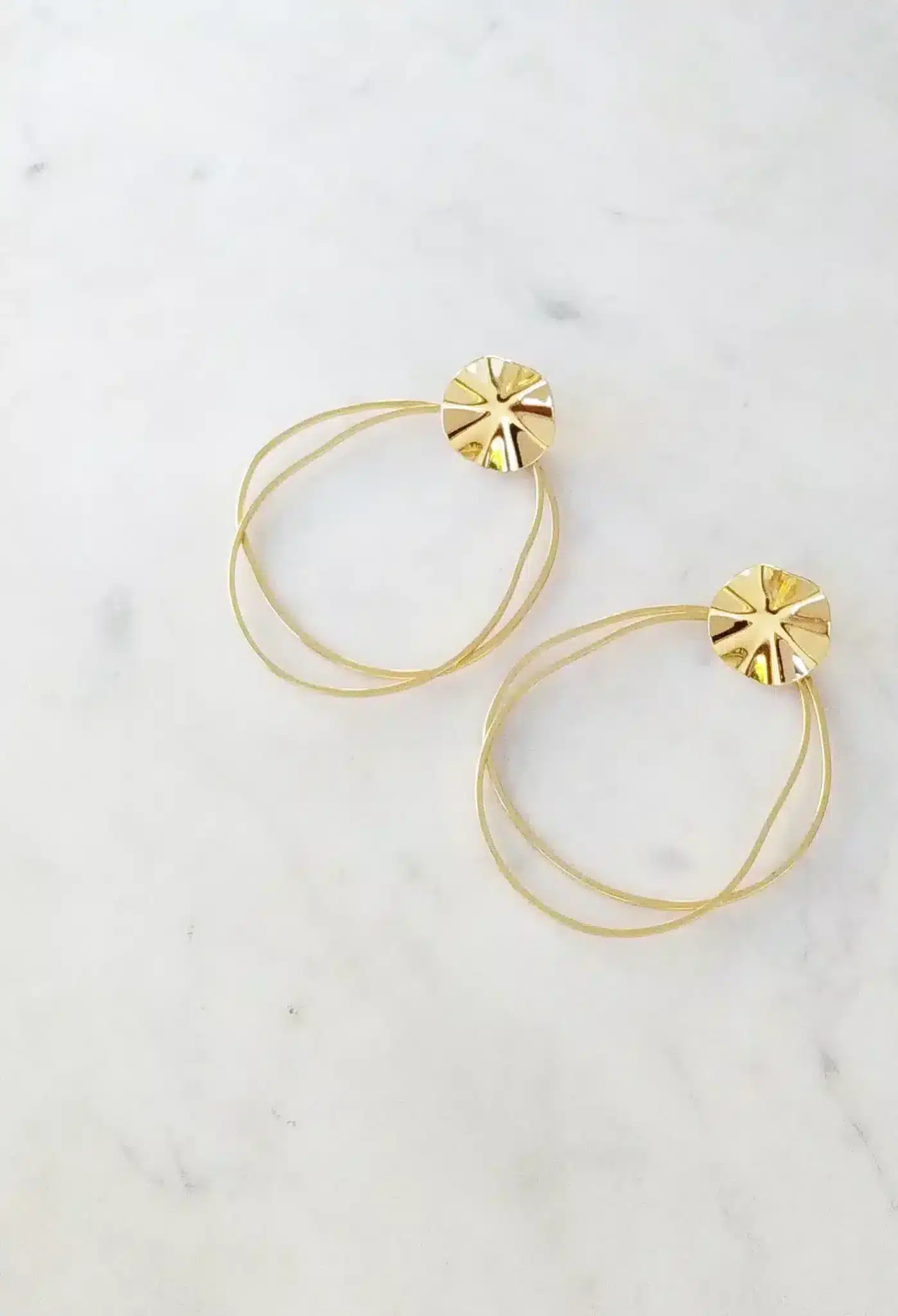 Boucles d'oreilles pendantes dorées - Marie Duvert